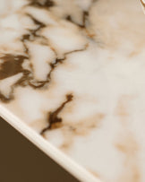 Austin console table in natural ceramic with brown veining detail, close-up of surface texture.