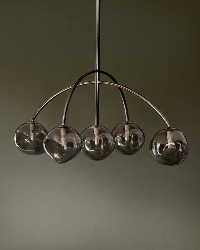 A stylish, contemporary chrome and glass sphere pendant light fixture. Perfect for adding modern flair.