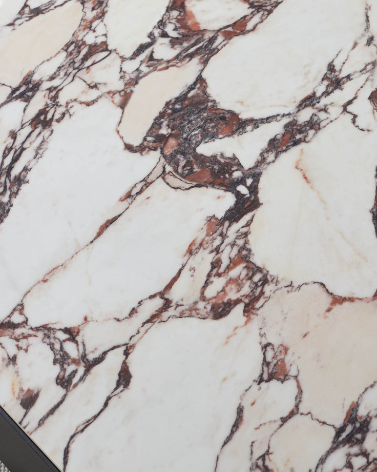 Bianco Garden coffee table top detail showing white Calacatta marble with brown and charcoal veining pattern.