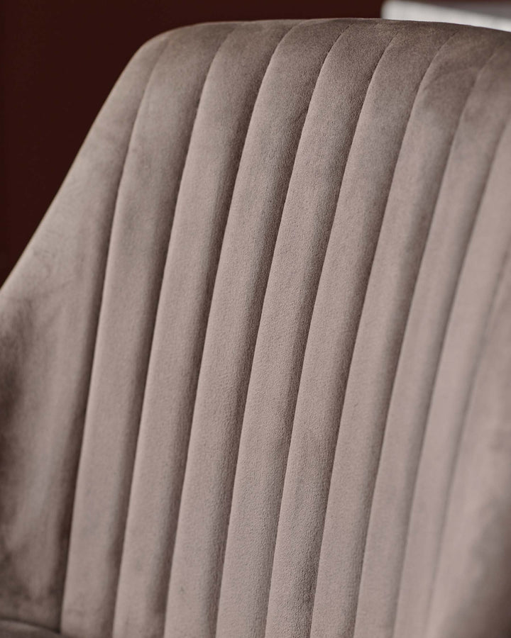 Close-up of a stylish chair back with vertical channel tufting in a soft, textured fabric, perfect for adding sophistication.