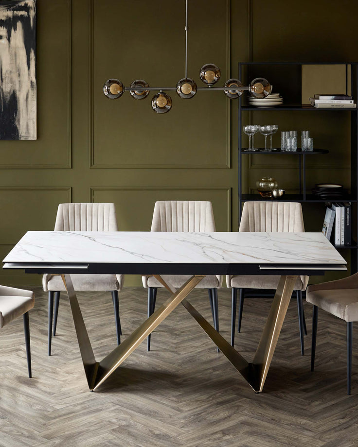 Modern dining table with a marble top, gold V-shaped base, and elegant beige upholstered chairs. Stylish lighting overhead.
