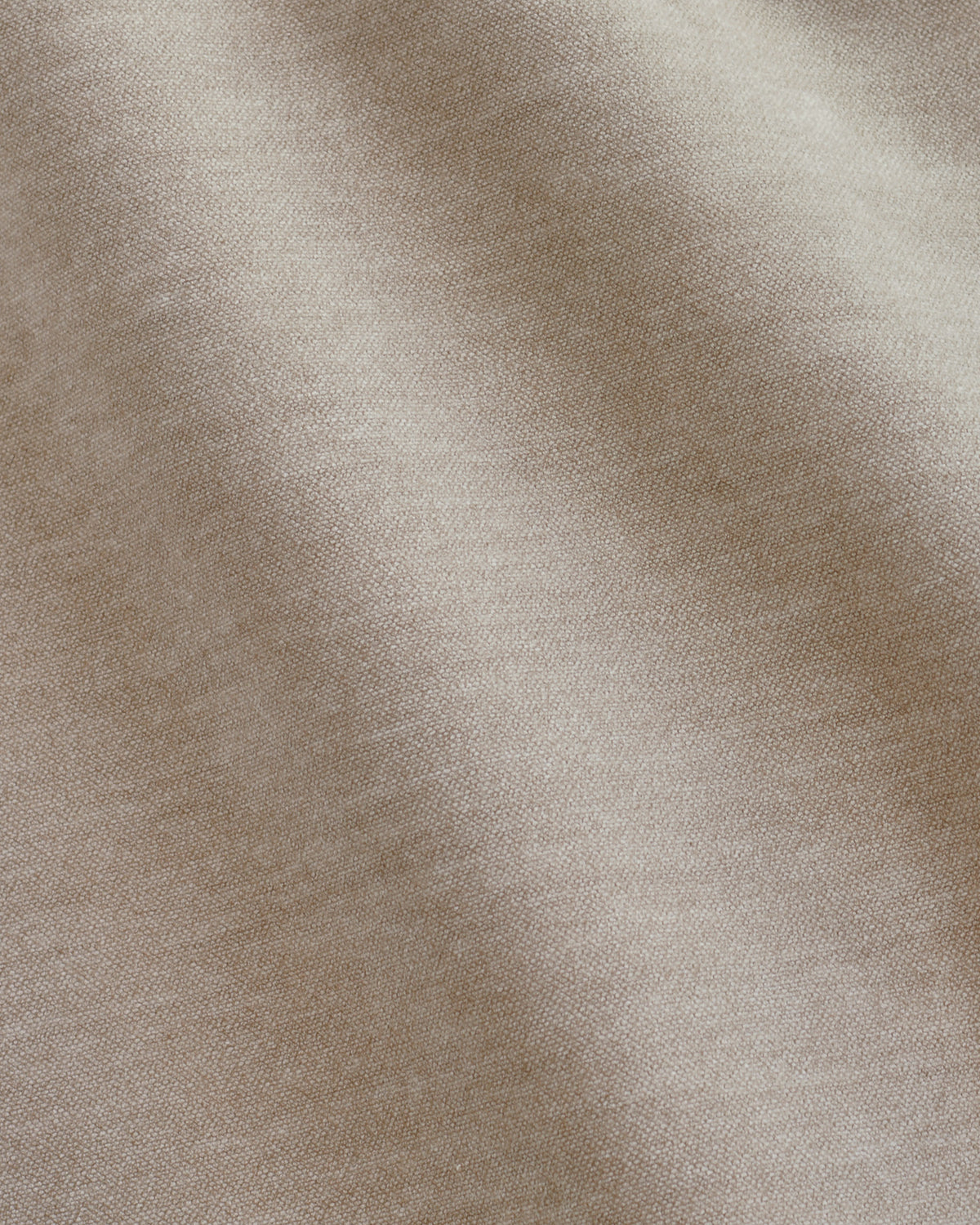 Champagne fabric close-up showing soft, neutral woven texture of Skye single sofa module.