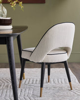 Clover ivory dual tone fabric dining chair with bronze legs