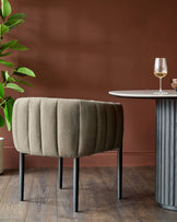 A stylish chair and table create an inviting space, perfect for a modern home design.