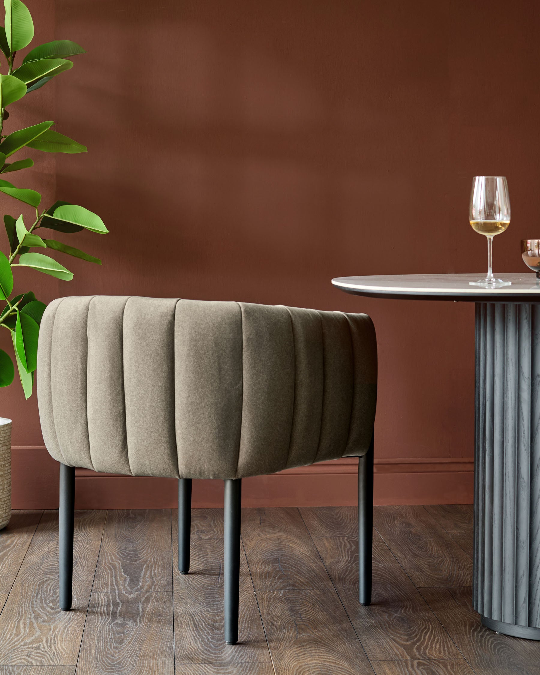 A stylish chair and table create an inviting space, perfect for a modern home design.