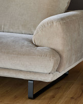 Colette right-hand corner chaise sofa in mink fabric, shown from side angle with metal feet on wooden floor.
