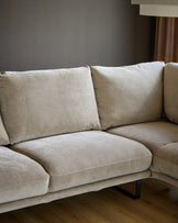 Colette right-hand corner chaise sofa in mink fabric, angled view showing plush cushions and dark metal legs on wooden floor.