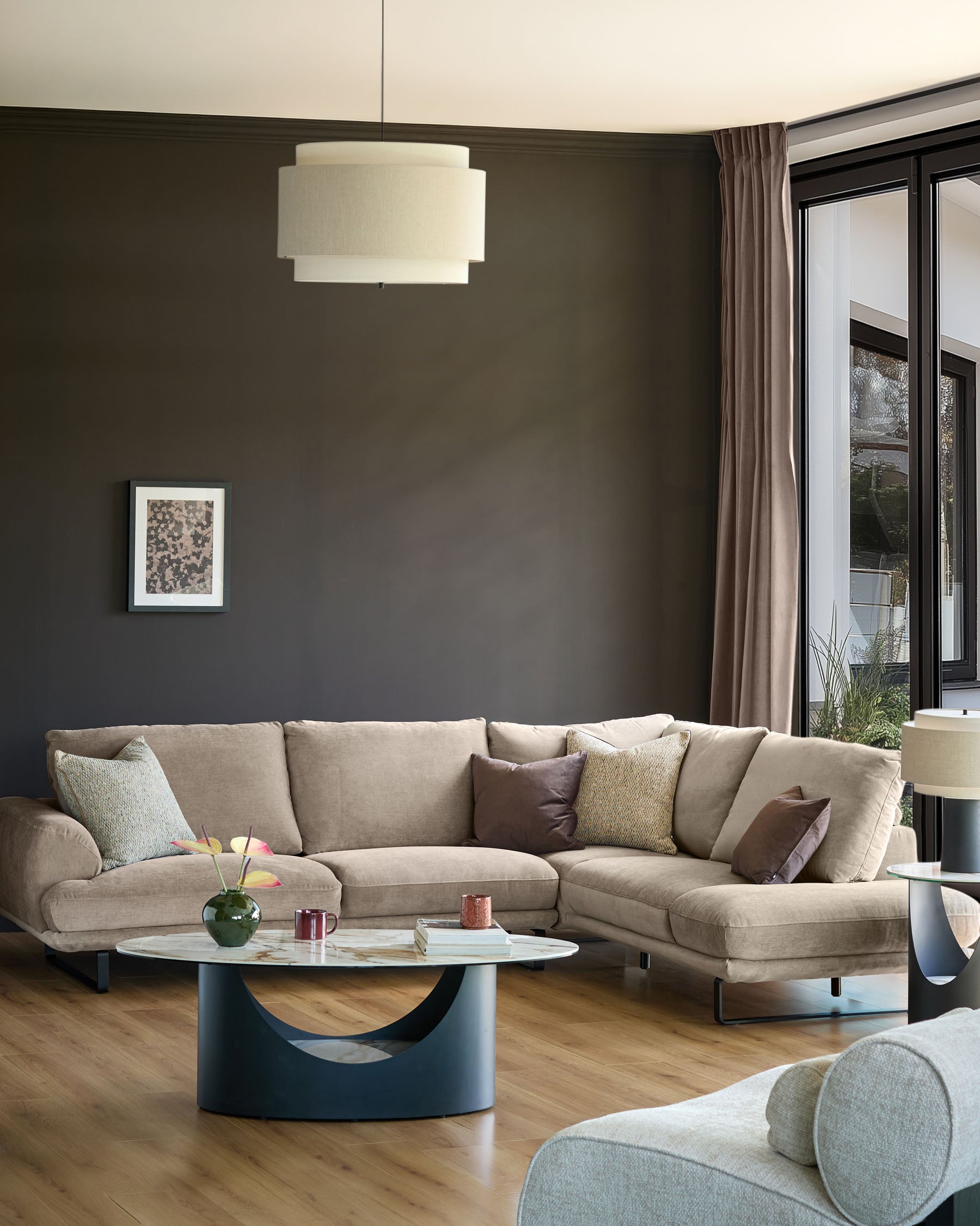 Colette right-hand corner chaise sofa in mink fabric, displayed in a modern living room with neutral décor and wooden flooring.