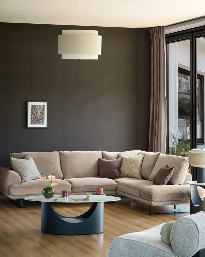 Colette right-hand corner chaise sofa in mink fabric, displayed in a modern living room with neutral décor and wooden flooring.