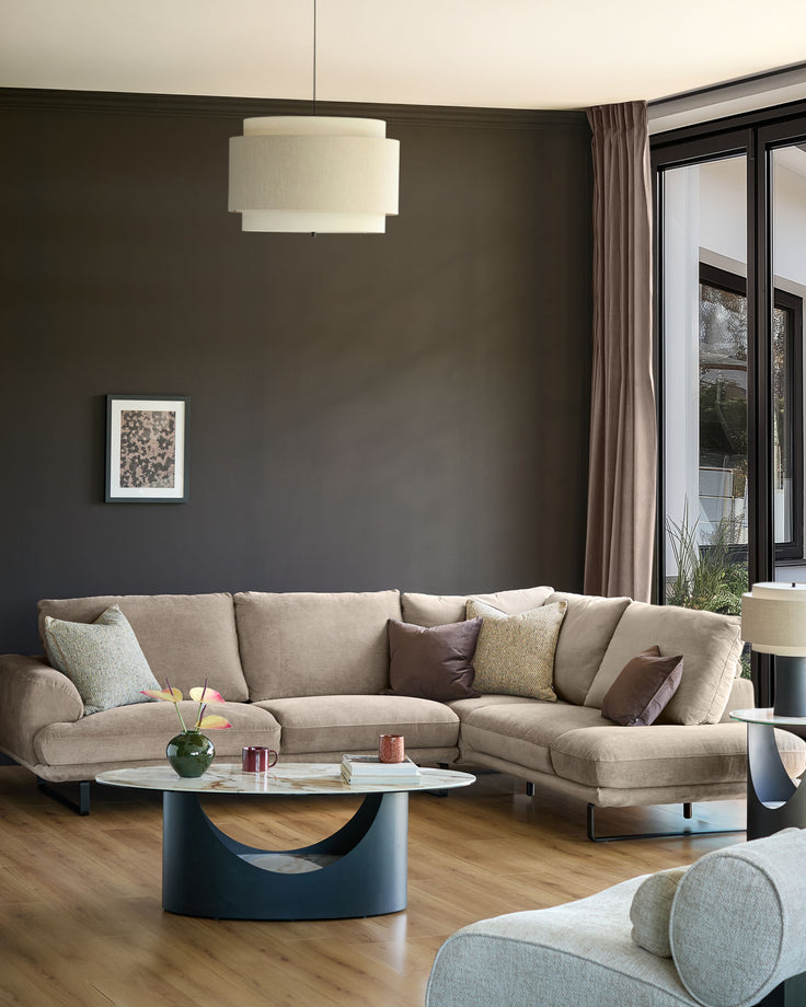 Colette right-hand corner chaise sofa in mink fabric, displayed in a modern living room with neutral décor and wooden flooring.