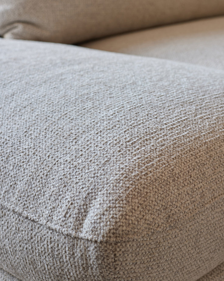 Colette left-hand corner chaise sofa in natural fabric, close-up detail of textured weave.