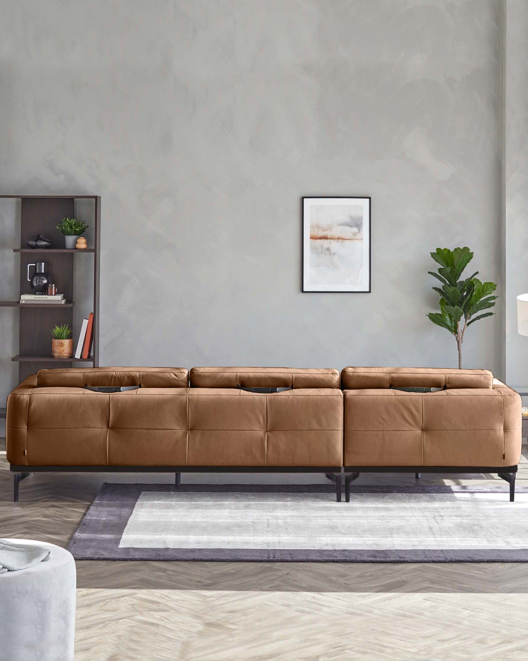 Stylish brown leather sofa with a modern design, displayed in a contemporary living room setting.