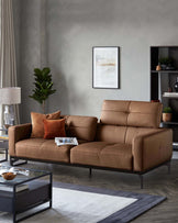 A contemporary leather sofa with a black frame, complemented by a glass coffee table and dark wood shelving.