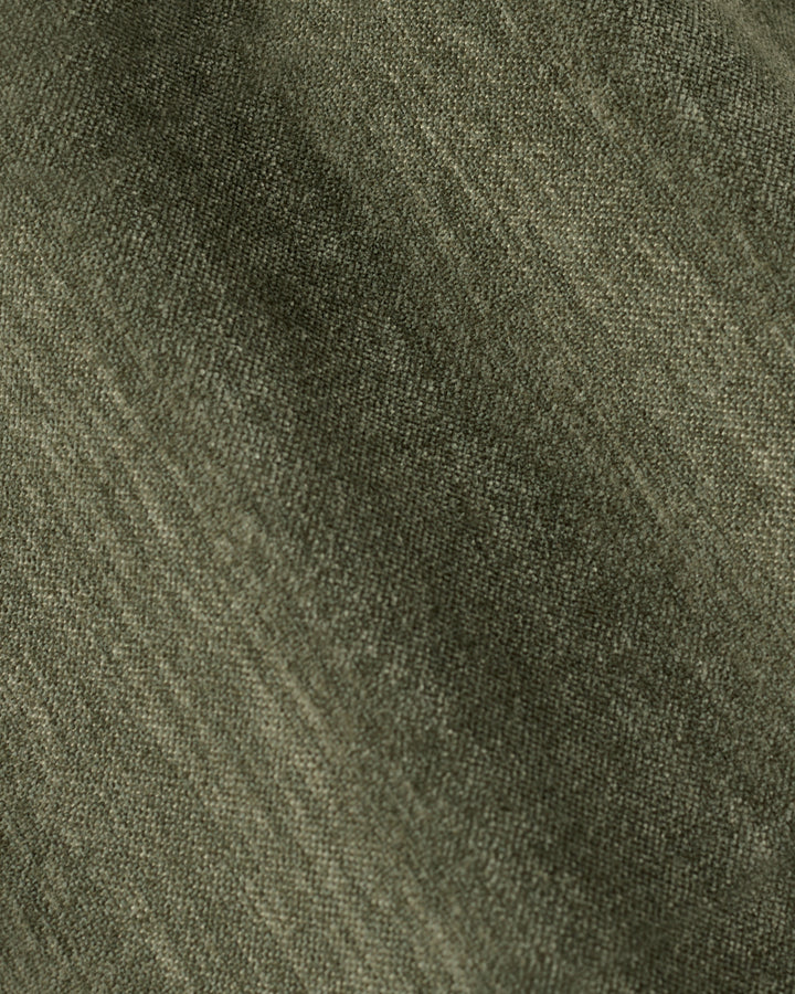 Gwen dark green chenille swivel armchair
