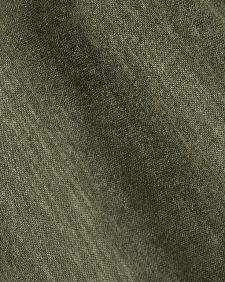 Gwen dark green chenille swivel armchair