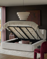 Darla king-size ottoman bed in natural fabric with open storage base, styled in modern bedroom setting.