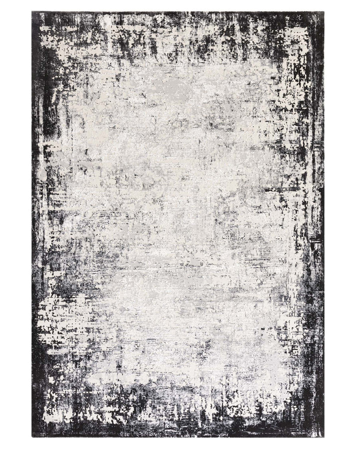 Modern abstract-patterned area rug featuring a grayscale colour palette with distressed black, white, and grey tones.