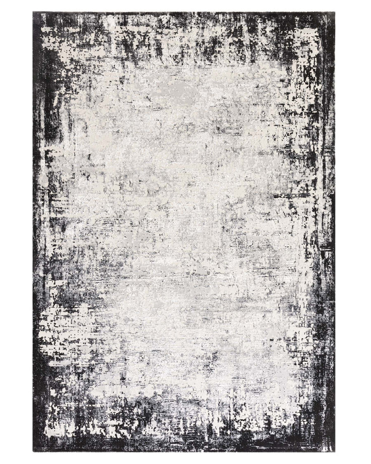 A stylish, contemporary rug with a distressed black and white design, adding a touch of modern elegance to any space.