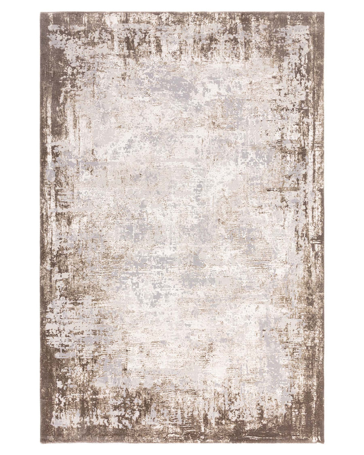 A modern patterned rug with a distressed, textured effect in neutral shades of grey and brown.