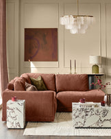 Eden right small chaise sofa in apricot fabric, displayed in a styled living room setting with coordinating decor.