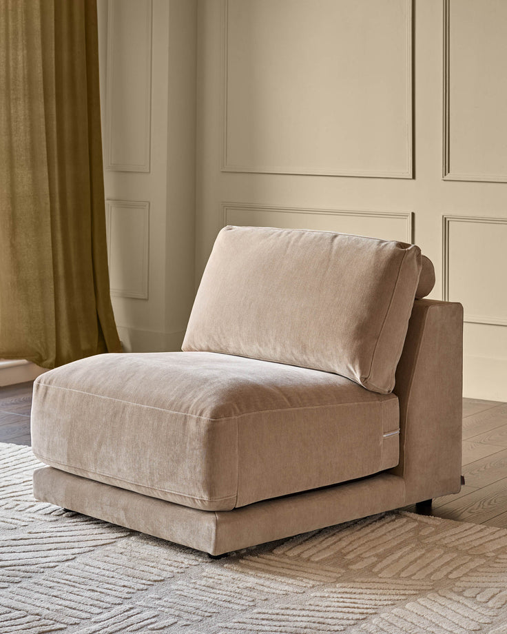 Champagne fabric single-module armchair with rolled arm and cushioned seat in modern living room setting.