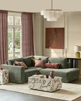 Dark green fabric right-facing chaise sectional sofa with curved arms, displayed in a styled living room setting.