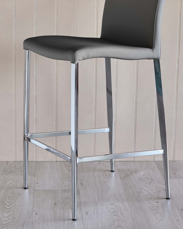 A modern grey bar stool with chrome legs. Contemporary and stylish design.