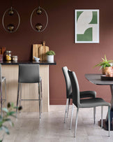 Contemporary kitchen with grey bar stools, dining chairs and table, and modern pendant lighting.