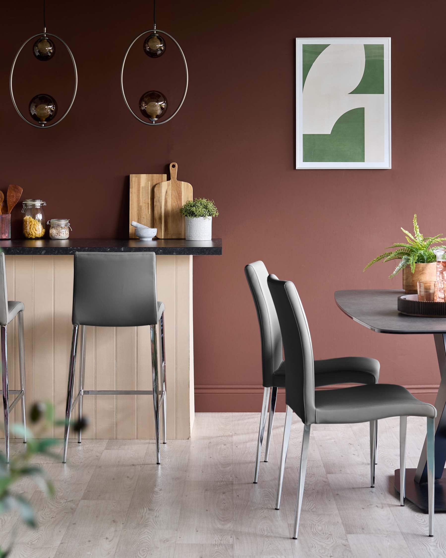 Contemporary kitchen with grey bar stools, dining chairs and table, and modern pendant lighting.