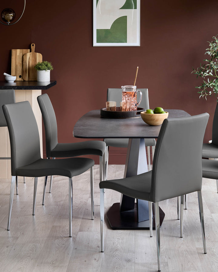 A modern dining set, featuring a grey table and chairs with chrome legs. A stylish and functional addition to any dining space.