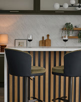 Elodie olive green velvet and black faux leather gas lift bar stool