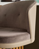 Elodie gas lift bar stool with mocha velvet and natural faux leather, showing curved backrest and seat detail from side angle.