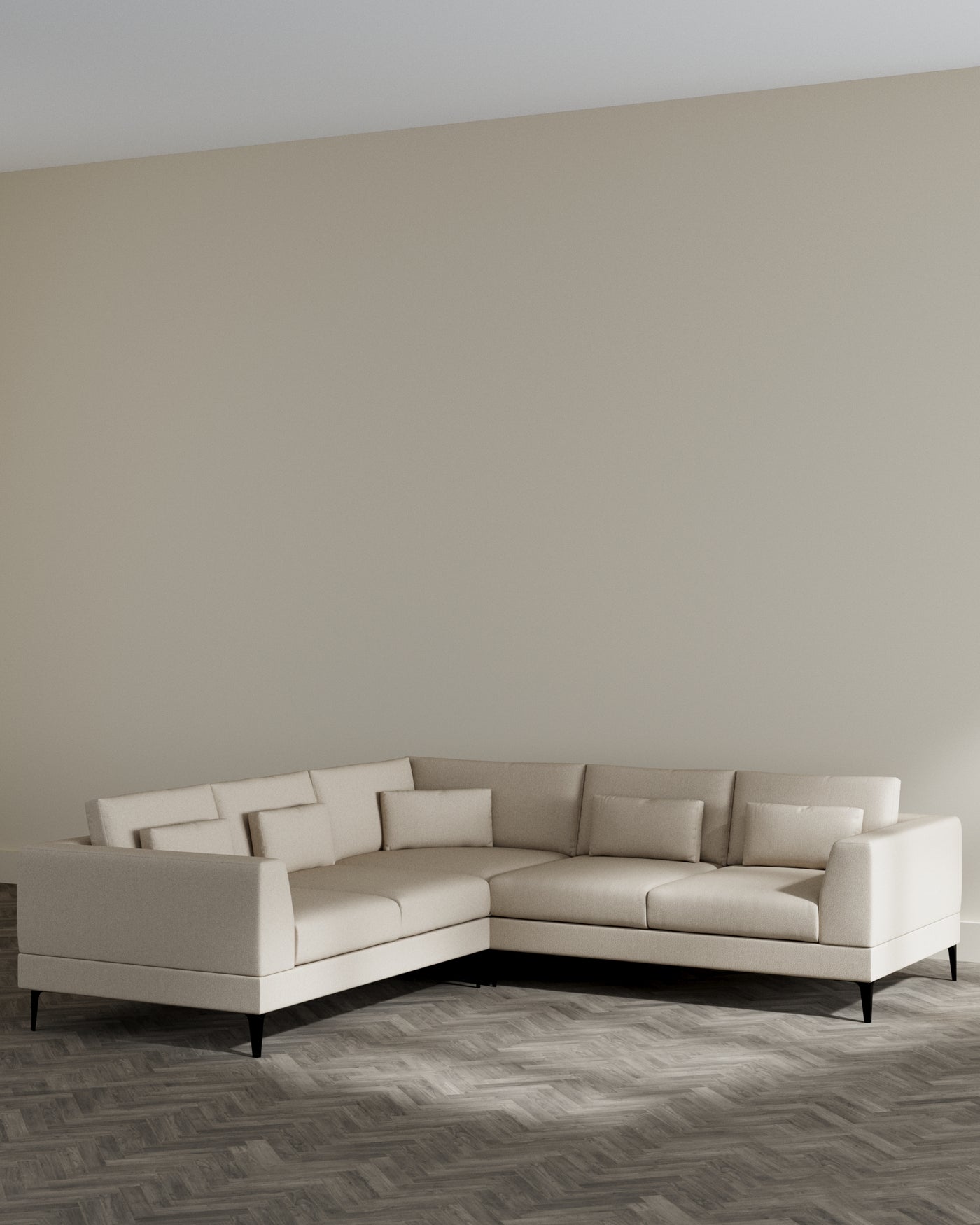 Modern L-shaped sectional sofa in a light cream fabric with minimalist design and slim black legs, positioned in a neutral-toned room with wood flooring.