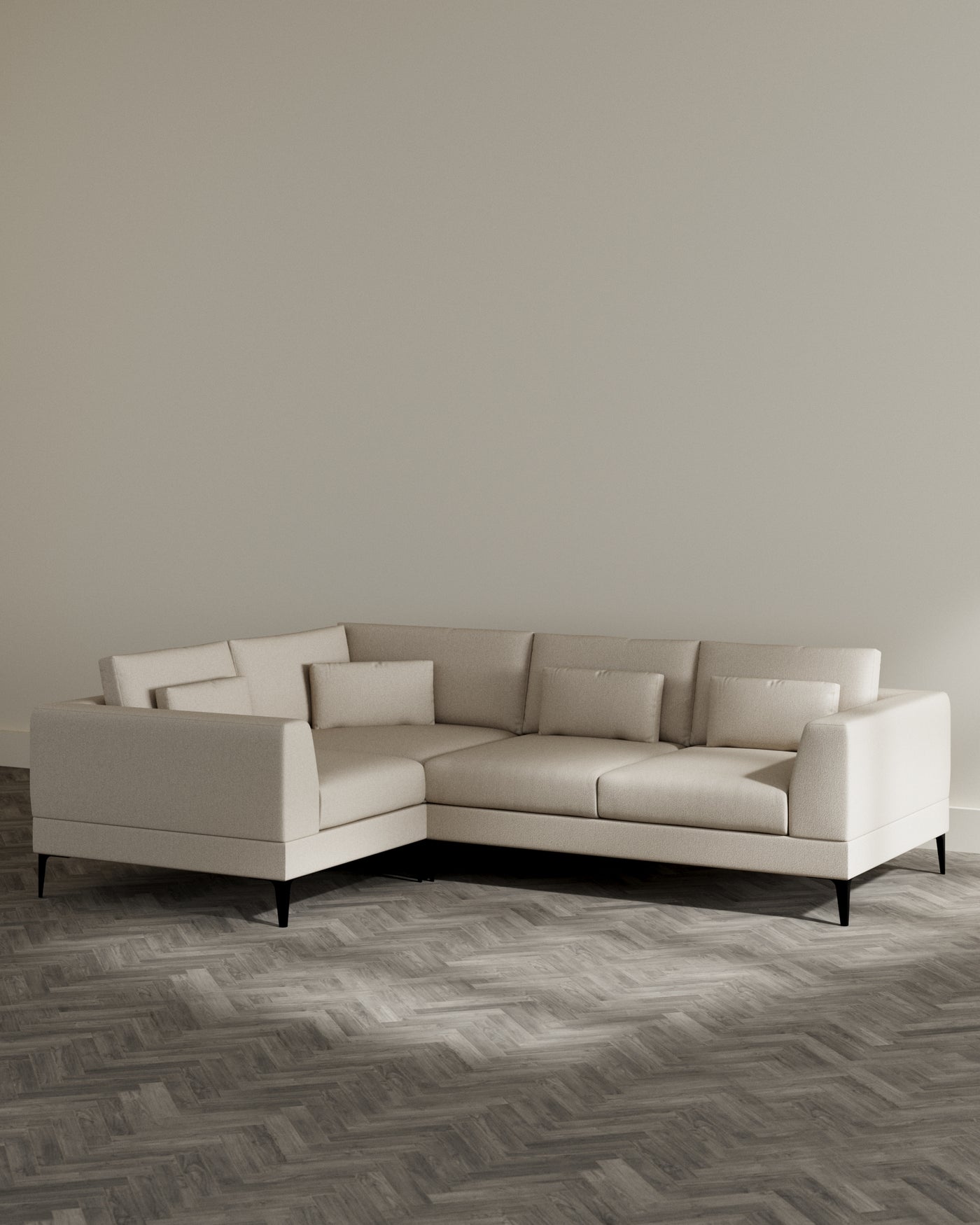 An elegant beige corner sectional sofa with a clean, contemporary design, featuring plush back cushions and a chaise lounge extension. The sofa has a subtly textured fabric upholstery and is supported by sleek, tapered wooden legs in a dark finish.
