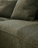 Close-up of dark green fabric texture on Eris left-hand corner chaise sofa, showing upholstered seat and cushions.