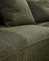 Close-up of dark green fabric upholstery on Eris right-hand corner chaise sofa, showing textured weave and cushion details.