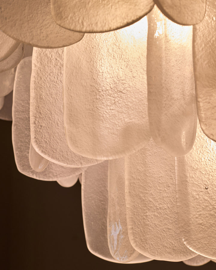 Estelle chandelier with frosted white glass panels in scalloped shape, close-up detail view.