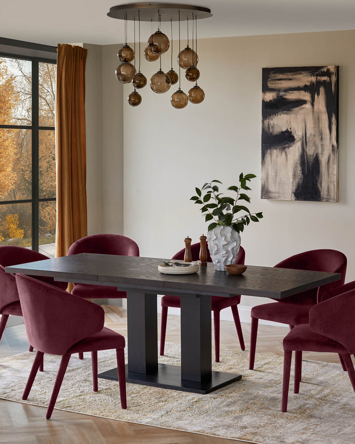Plum velvet dining chair with curved back and wooden legs, shown at dining table in modern room setting.