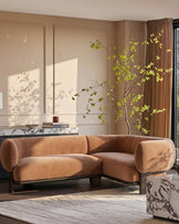 Florence right-hand-facing small corner sofa in apricot fabric with dark wood legs, displayed in a modern living room setting.