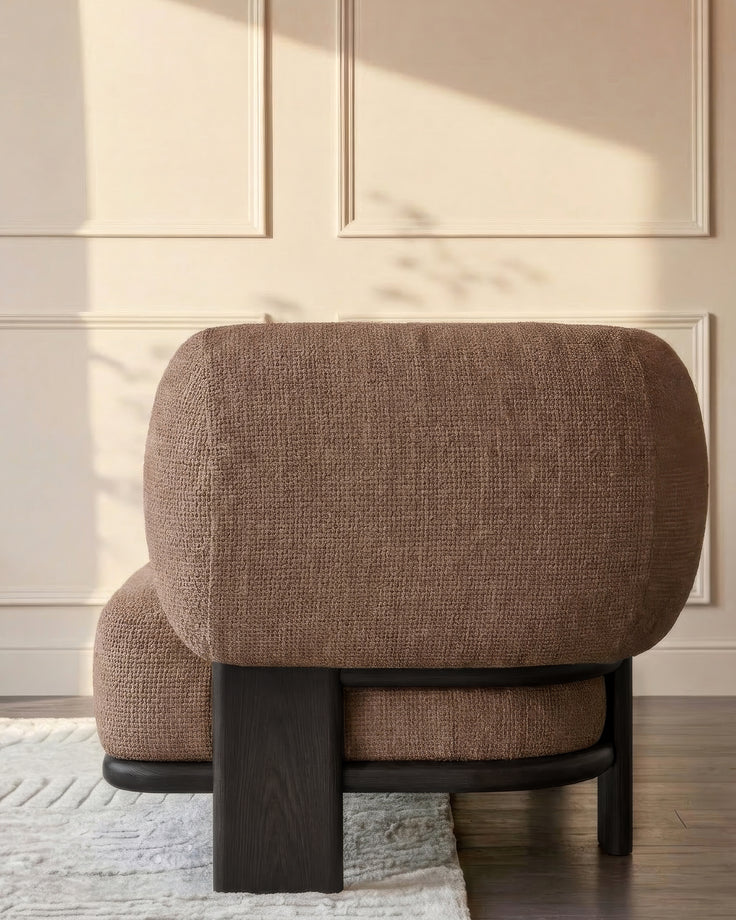 Florence left-hand-facing small corner sofa in mocha fabric with dark wood legs, shown from rear angle in bright room.