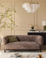 Florence 2-seater sofa in mocha fabric with dark wood frame, curved design, displayed in modern living room setting.