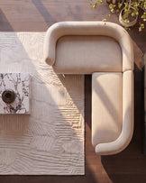 Florence left-hand-facing small corner sofa in natural fabric, viewed from above on wooden floor with plants.