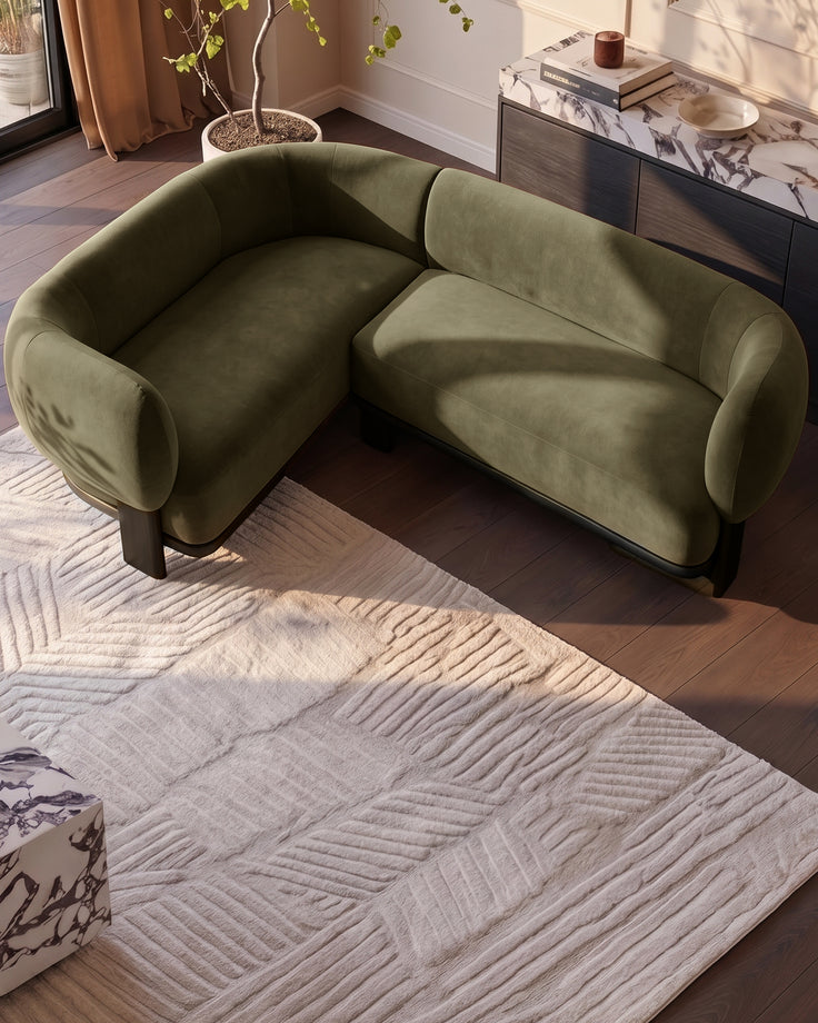 Florence left-hand-facing small corner sofa in dark wood and olive-green fabric, displayed in modern living room setting.