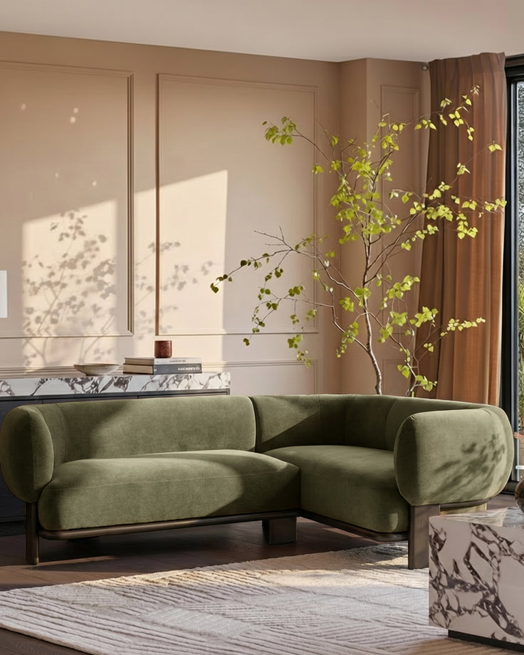 Florence right-hand-facing small corner sofa in olive green fabric with dark wood legs, displayed in a bright living room setting.