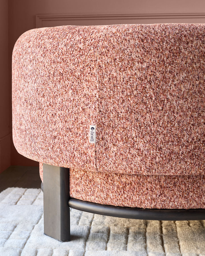 Florence armchair in toffee-red weave fabric with dark wood legs, shown from side angle on neutral rug.