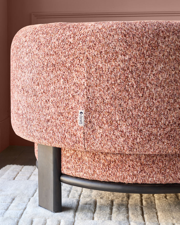 Florence armchair in toffee-red weave fabric with dark wood legs, shown from side angle on neutral rug.