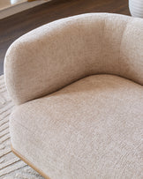 Florence 2-seater sofa in natural fabric with curved back and natural wood base, angled side view.