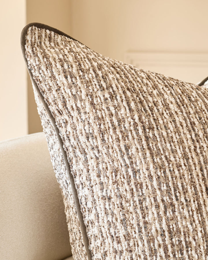 Franco large cushion in chocolate brown textured weave, displayed at an angle showing its ribbed surface detail.