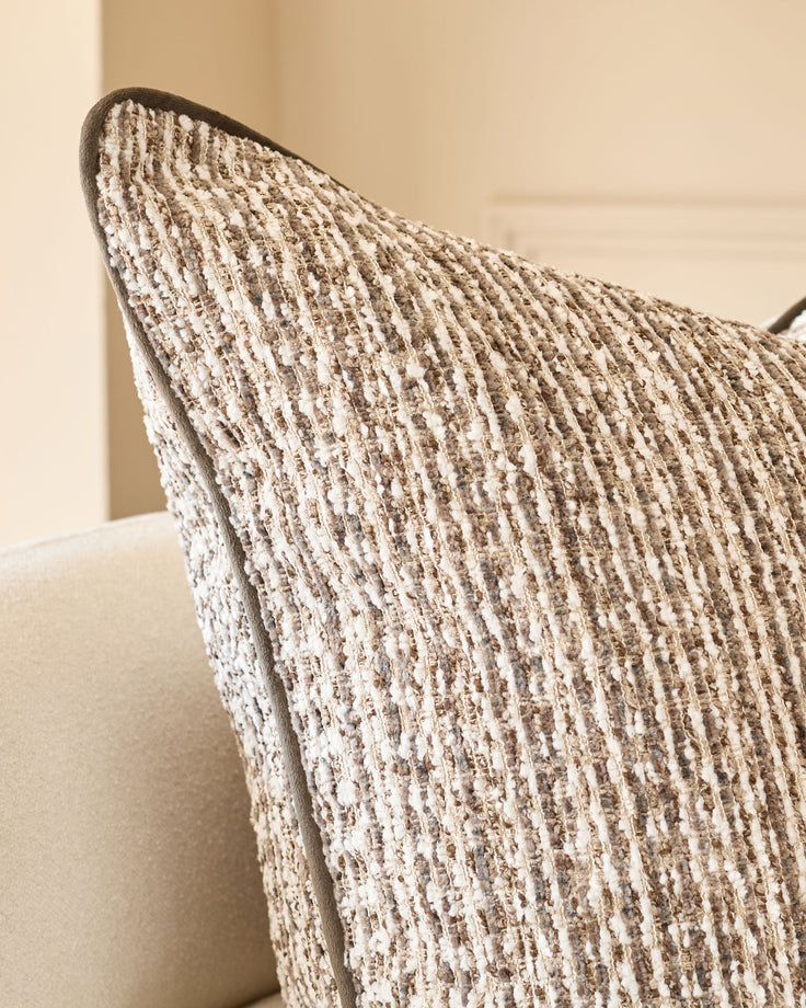 Franco large cushion in chocolate brown textured weave, displayed at an angle showing its ribbed surface detail.