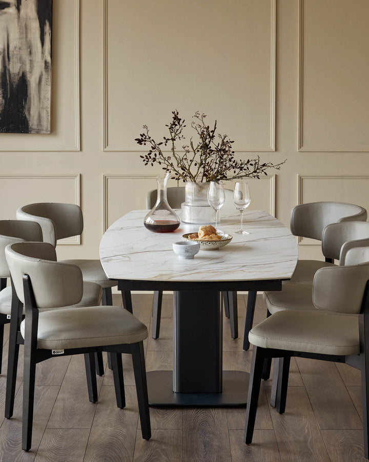 A dining table with a marble top and six upholstered chairs create an elegant dining space.